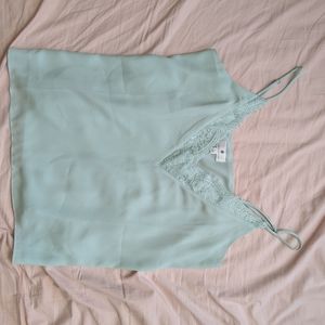 Icy blue camisole with lace neckline